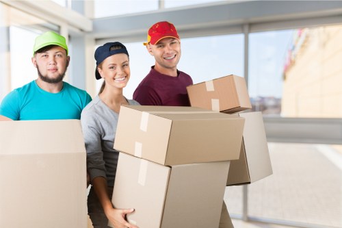 Loading furniture and boxes into a removal van in Putney