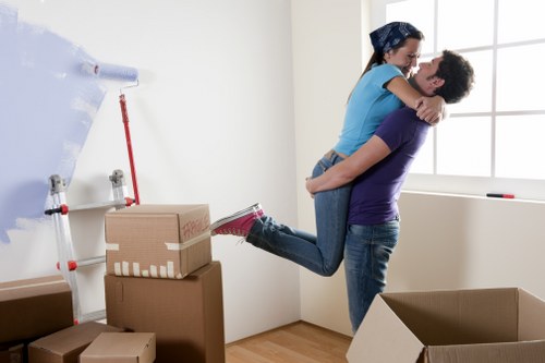 Professional removalists unloading a family home move in Putney