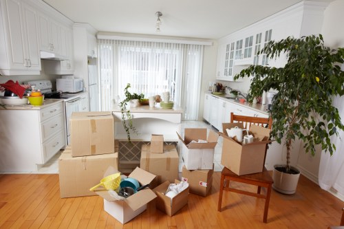 Local removals van loading office equipment in Putney