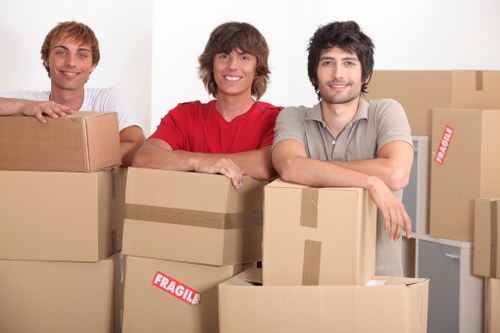 Furniture and boxes being loaded into a van for a Putney removal