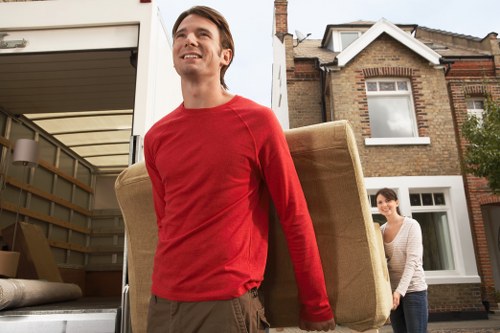 Local moving vehicle on a residential street in Putney