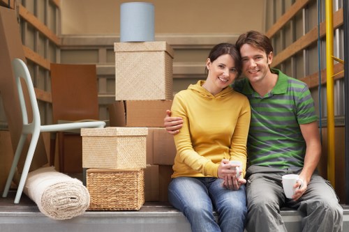 Professional movers loading a van for a Putney relocation