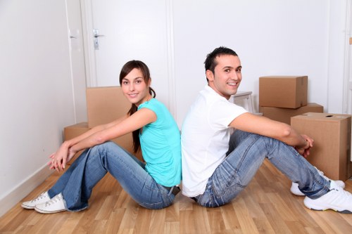 Putney removals van helping with furniture and boxes