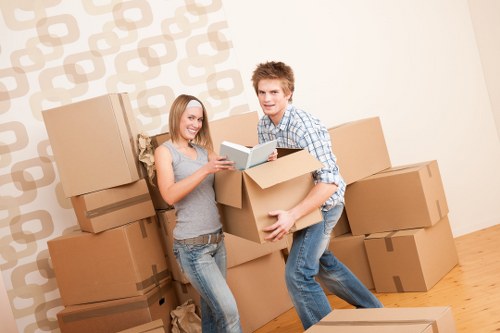 Loading unwanted furniture for pick-up in Putney